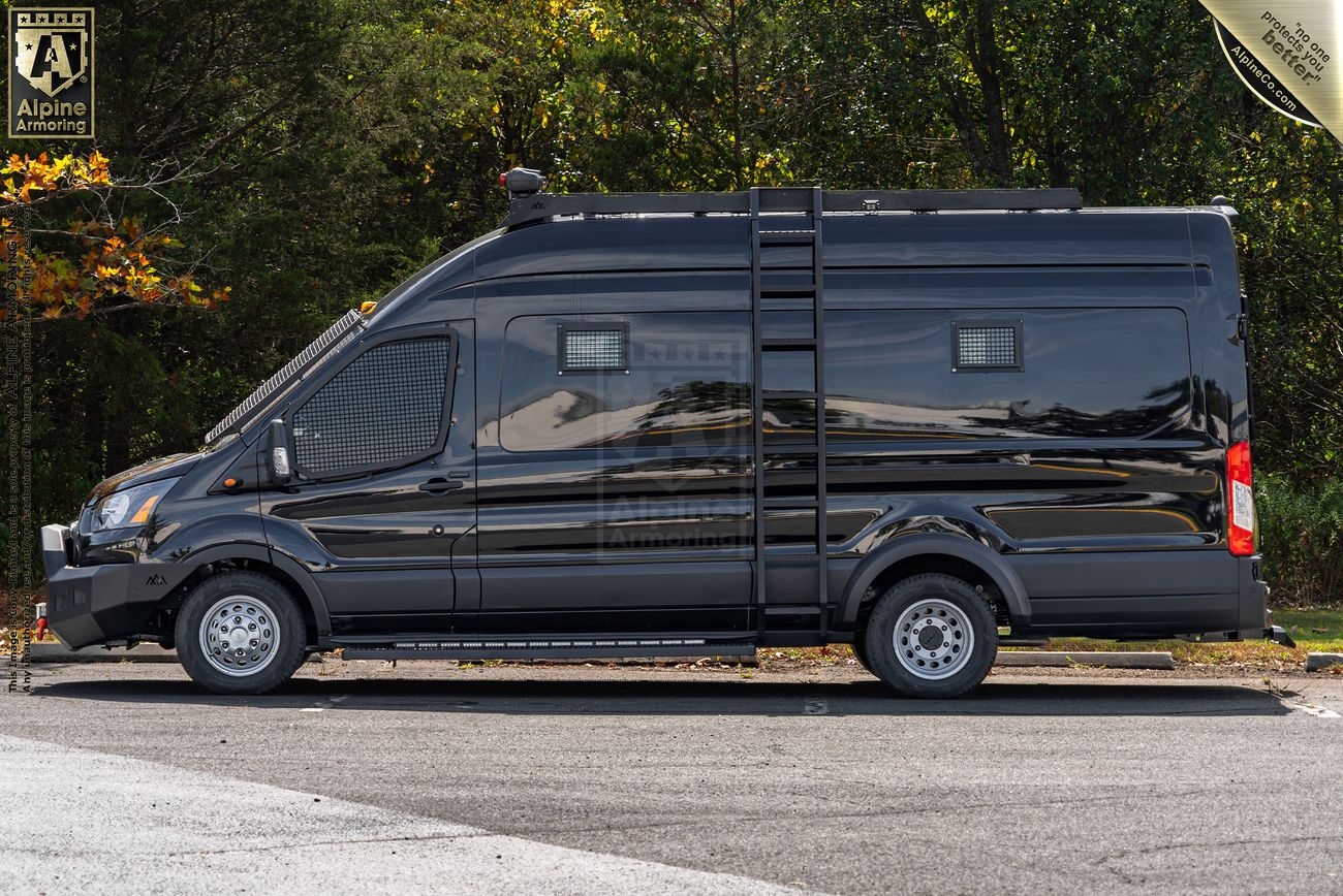 A view from the left of a black armored SWAT van, known as the Armored Pointer from Alpine Armoring, featuring reinforced windows, tactical lighting, and advanced security features.